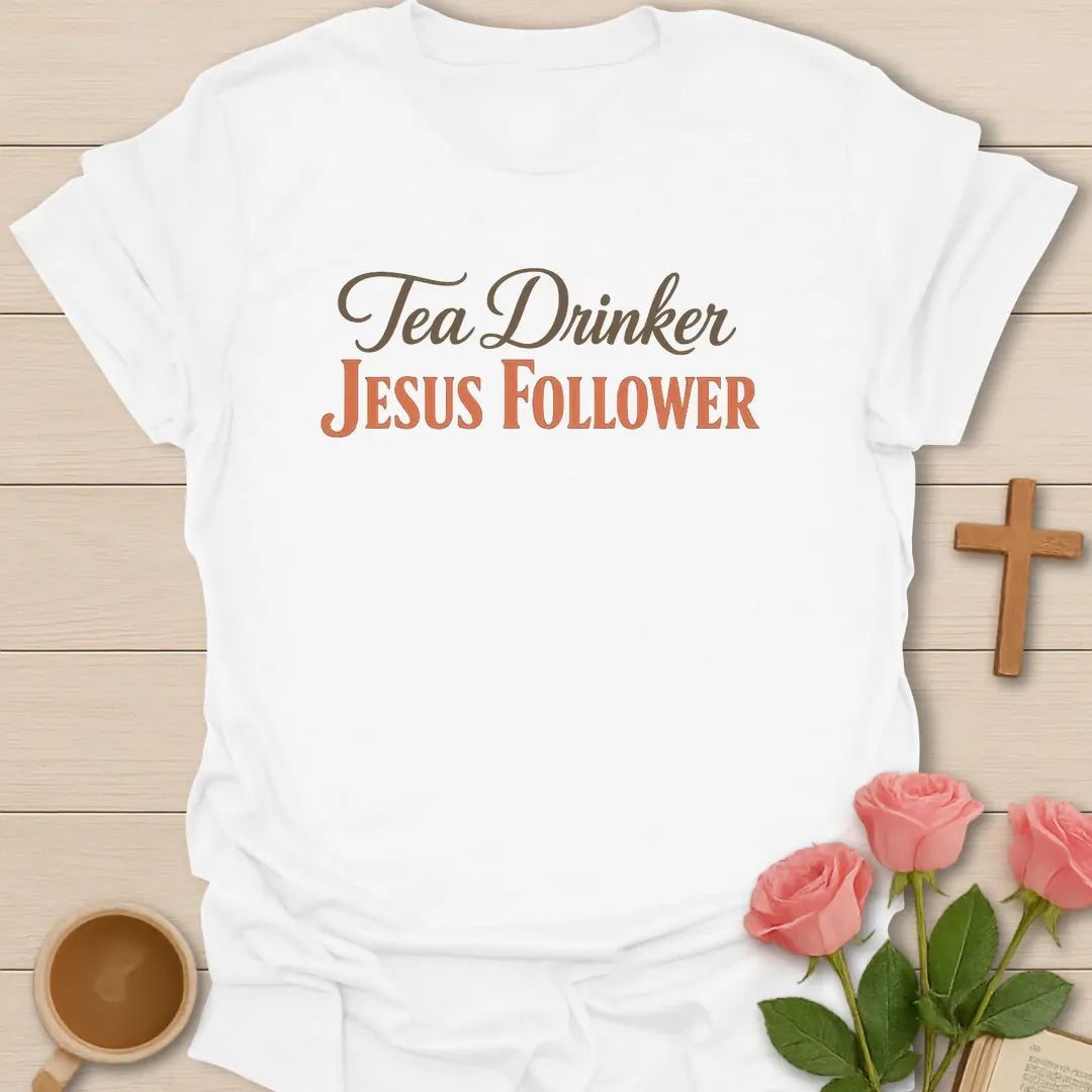 Tea Drinker Jesus Follower shirt with teacup, cross, and cream vintage lettering. - White
