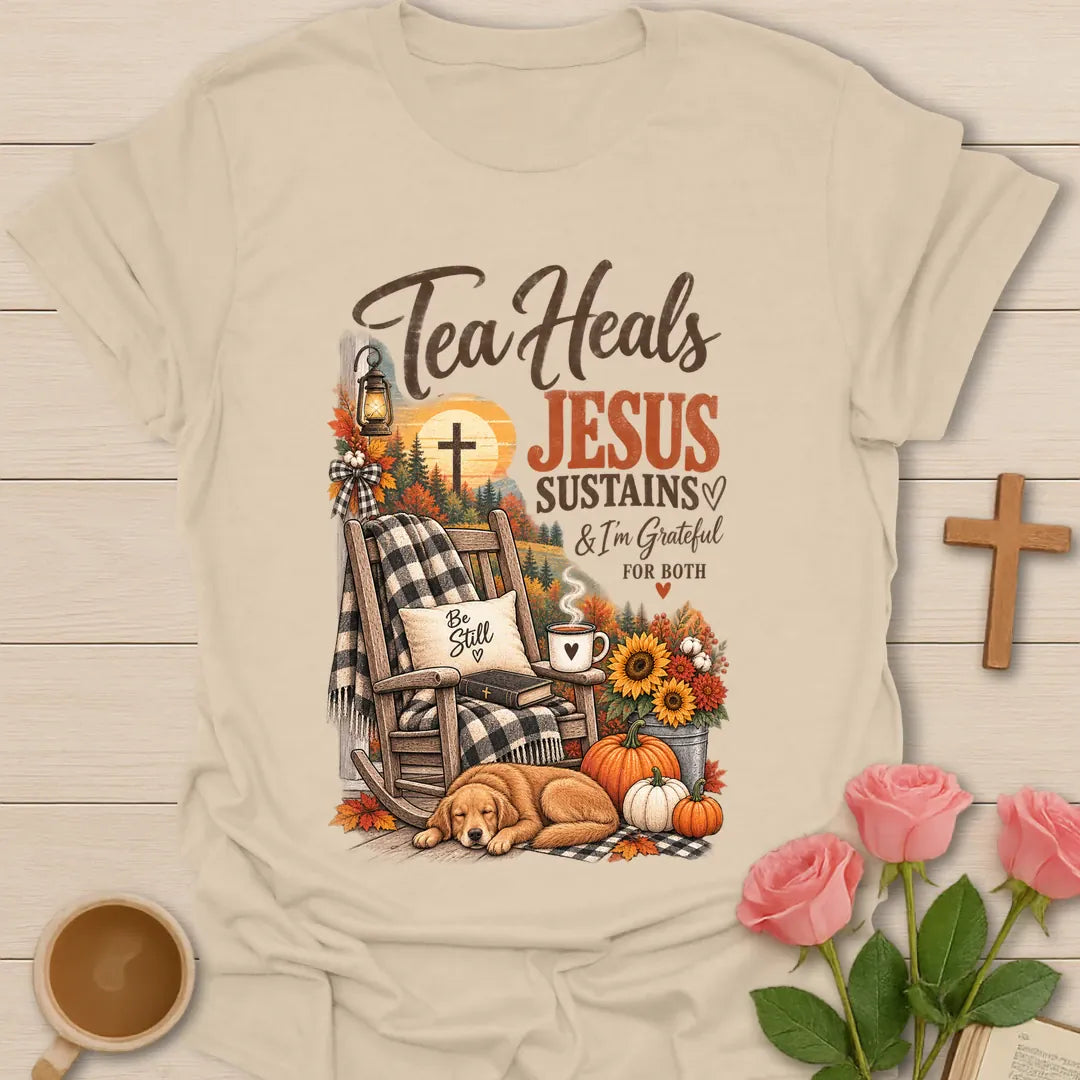 Tea Heals Jesus Sustains shirt with gentle lettering and a faith-inspired tea design. - Sand