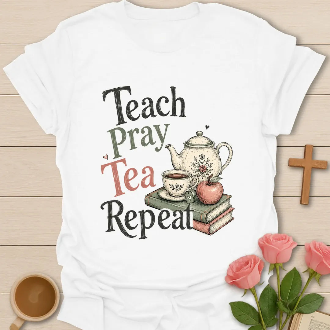 Teach Pray Tea Repeat shirt with stacked red and green lettering, green teapot silhouette, red apple, stars, and vintage distressed texture. - White
