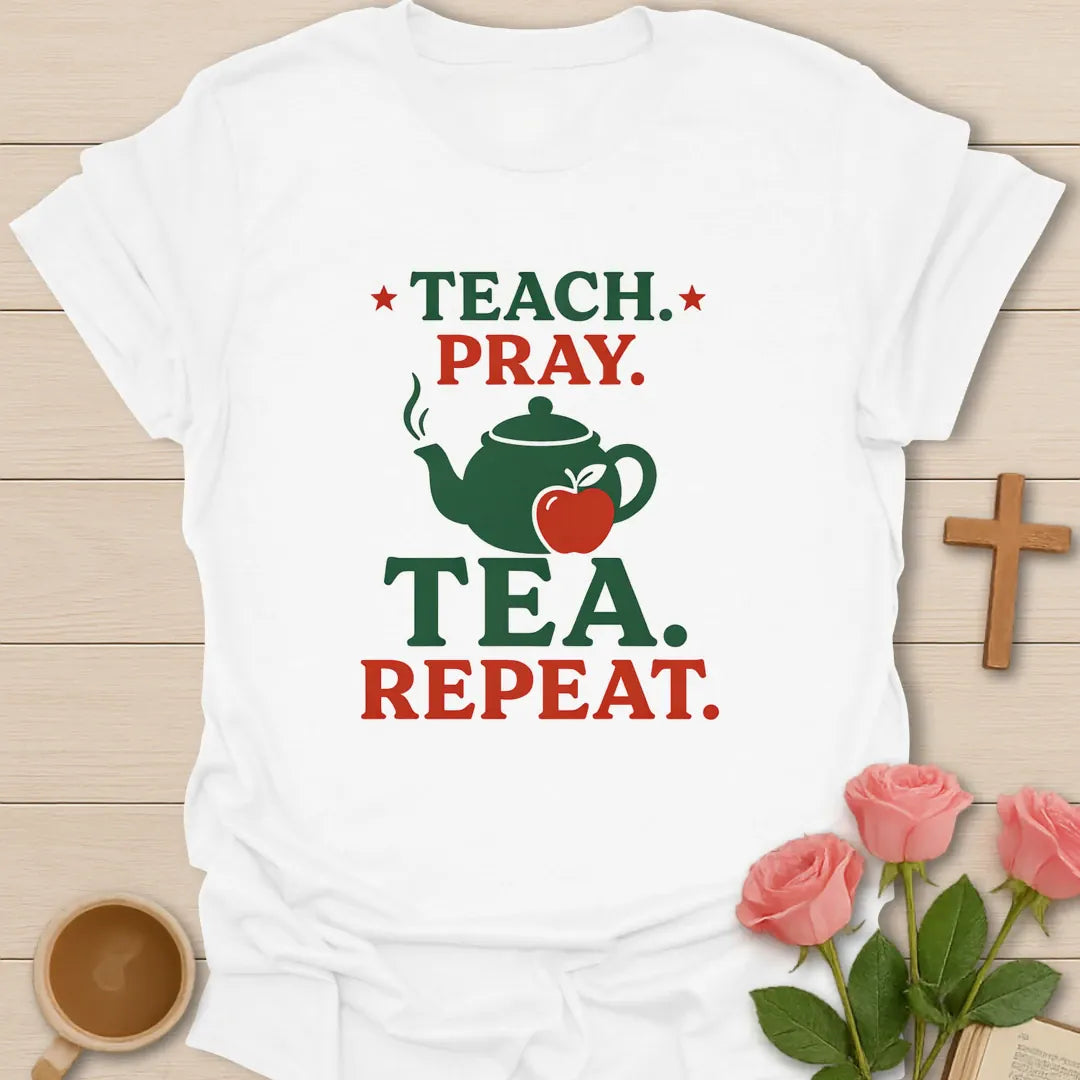 Teach Pray Tea Repeat shirt with stacked red and green lettering, green teapot silhouette, red apple, stars, and vintage distressed texture. - White