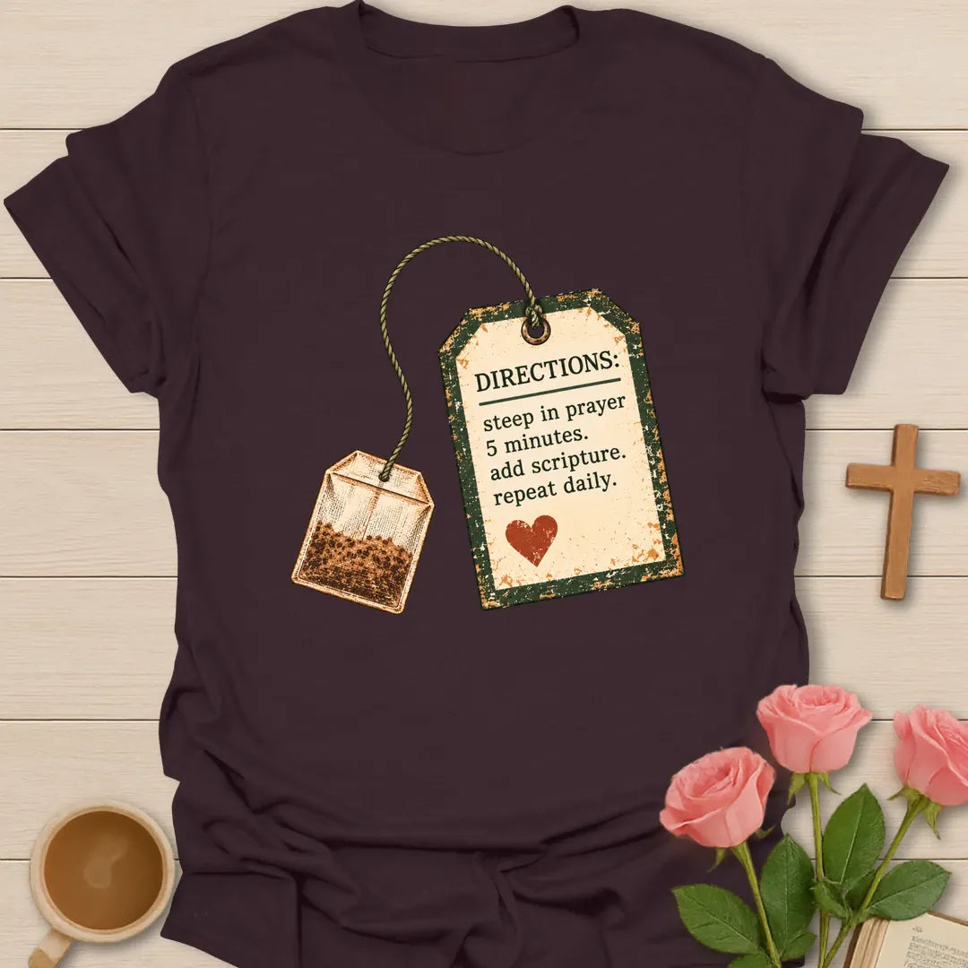 Christian t-shirt with a vintage tea bag and tag reading Directions: steep in prayer 5 minutes, add scripture, repeat daily - Dark Chocolate