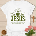 Tea and Jesus shirt with green teacup, cross, heart, sun rays, and comfort my soul message. - White
