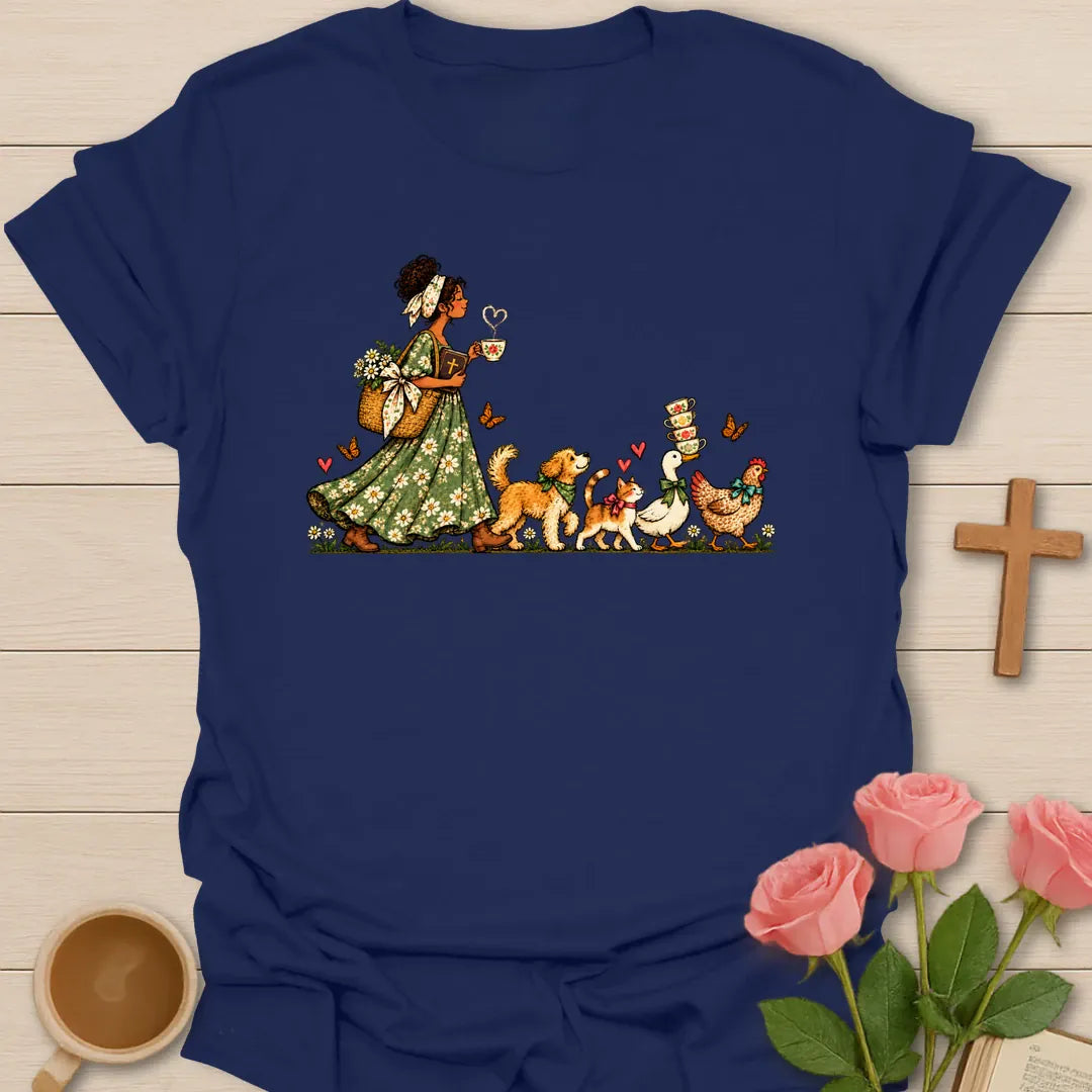 Tea-Time Parade t-shirt with a woman in a floral dress holding a teacup, followed by a dog, a cat, a goose and a chicken carrying teacups - Navy