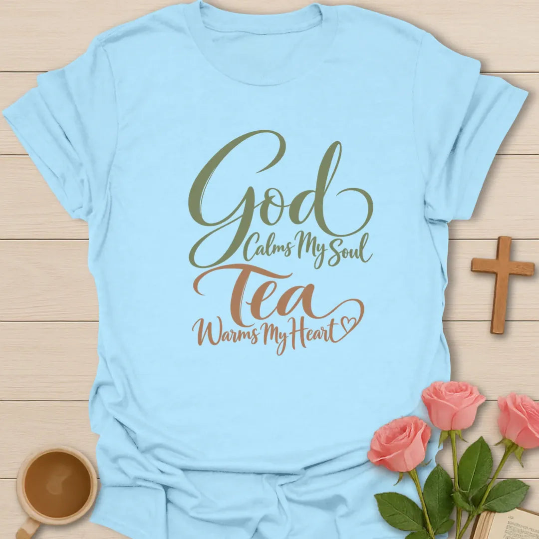 Tea Warms My Heart Christian tea t-shirt with cozy lettering and faith-inspired design. - Light Blue