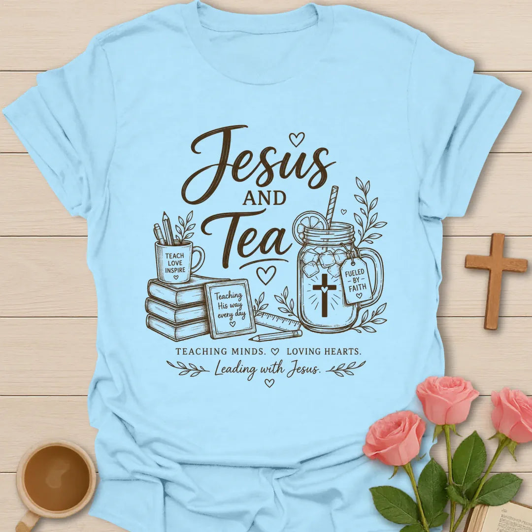 Teacher Leading With Jesus and Tea shirt with teacup, cross, classroom-inspired faith design, and Christian teacher lettering. - Light Blue