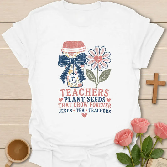 Teachers Plant Seeds shirt with floral pencil jar, navy bow, pink flower with cross, stacked text, hearts, and Jesus Tea Teachers phrase. - White