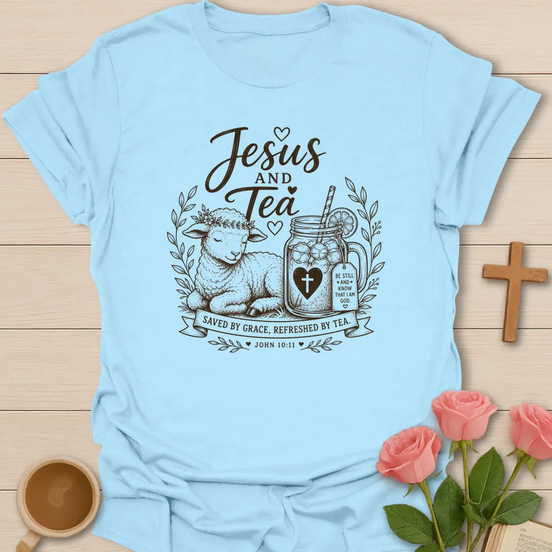 Light Blue The Lamb Jesus and Tea shirt with lamb, mason jar iced tea, cross heart, leaves, ribbon, and John 10:11 text. 