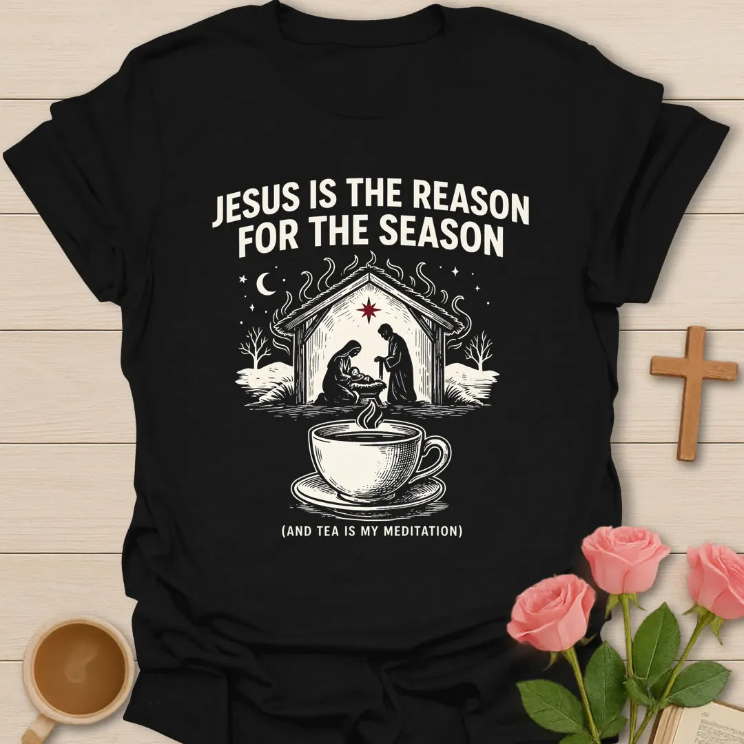Jesus is the Reason for the Season shirt with nativity scene, steaming teacup, stars, and Christmas faith text. - Black