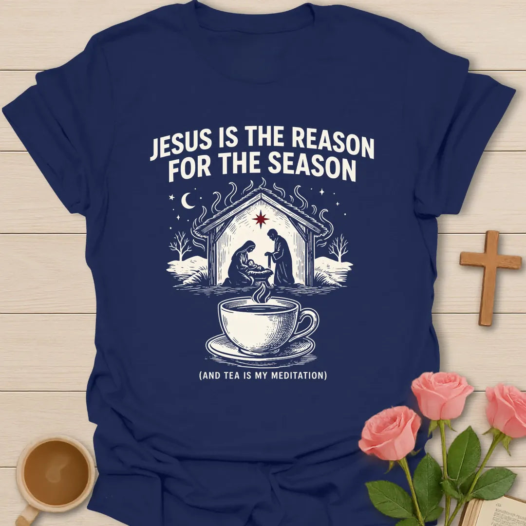 Jesus is the Reason for the Season shirt with nativity scene, steaming teacup, stars, and Christmas faith text. - Navy