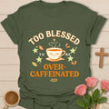 Too Blessed To Be Over Caffeinated Christian shirt with sleepy teacup, stars, leaves, and cross. - Military Green