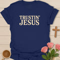 Trustin Jesus shirt with large cream vintage block lettering and distressed texture. - Navy