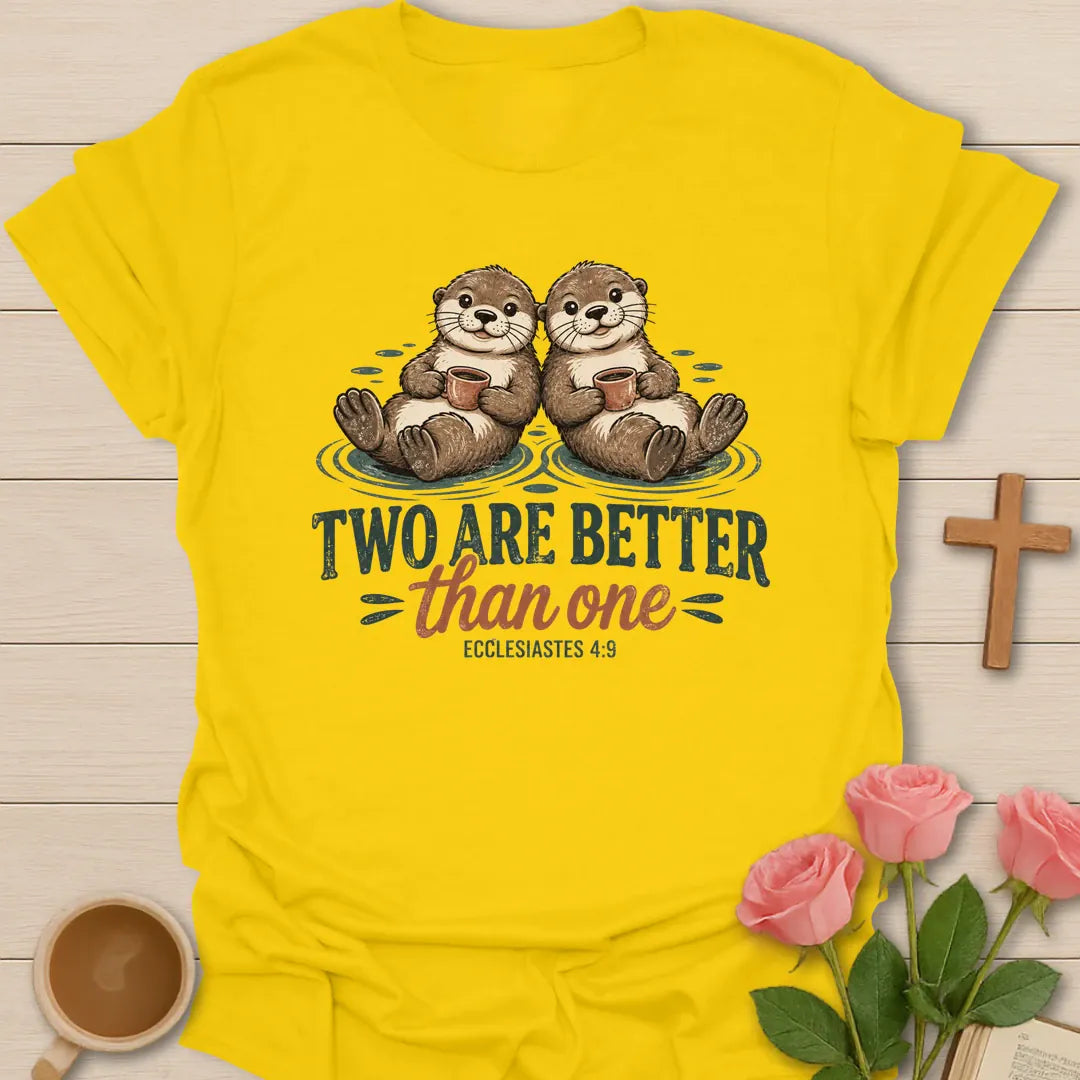 Two Are Better Than One Christian t-shirt with two smiling otters floating side by side holding mugs and Ecclesiastes 4:9 - Daisy