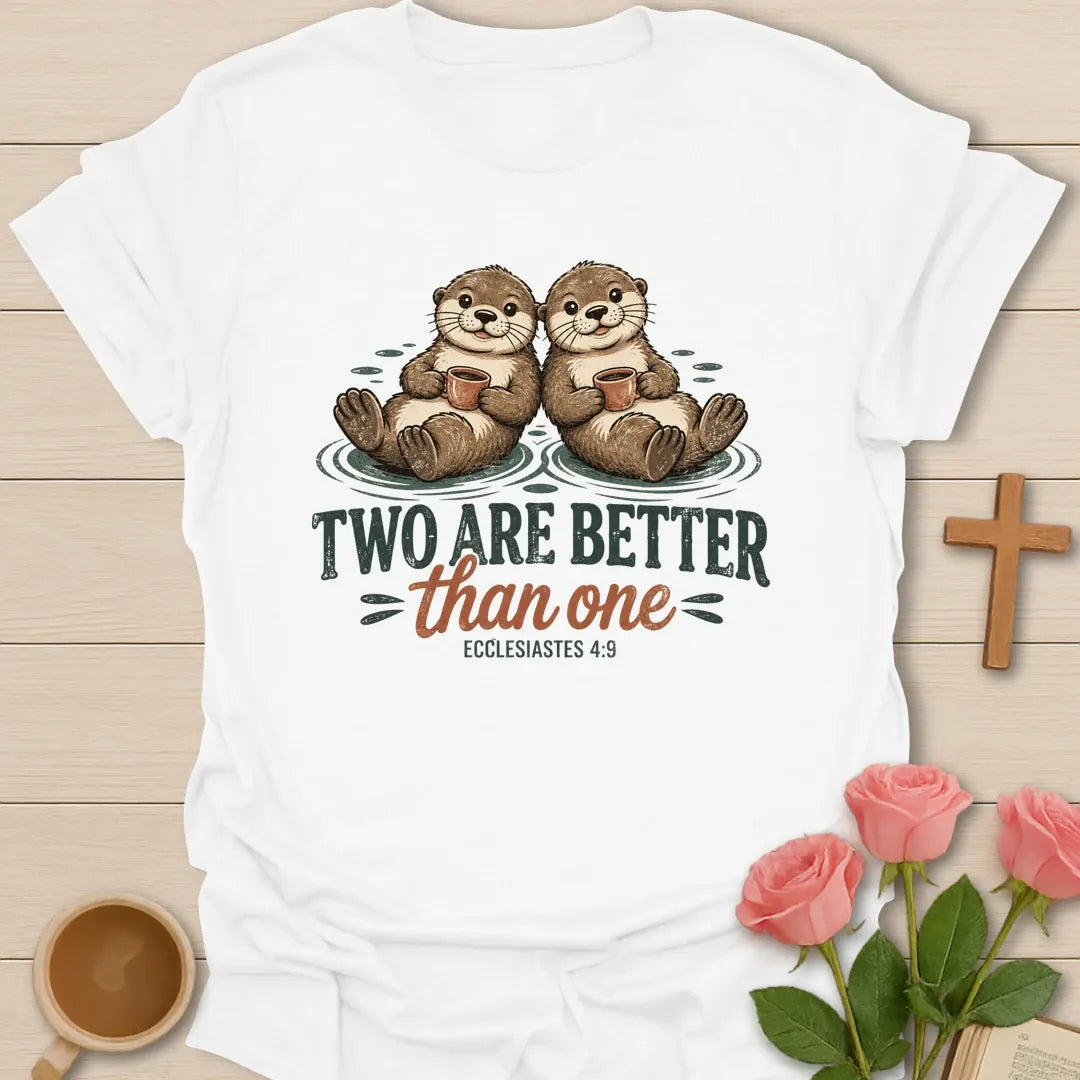 Two Are Better Than One Christian t-shirt with two smiling otters floating side by side holding mugs and Ecclesiastes 4:9 - White