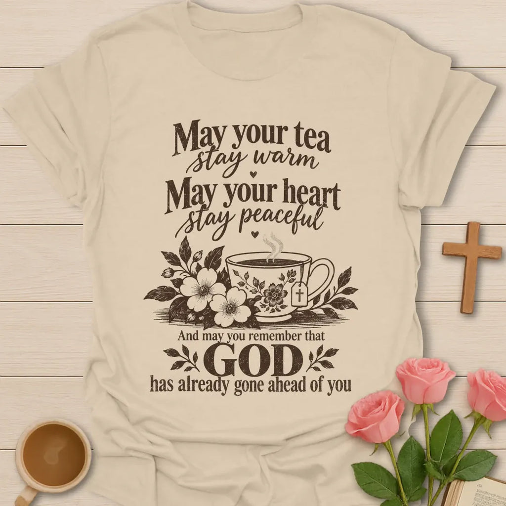 May Your Tea Stay Warm, May Your Heart Stay Peaceful, God Has Already Gone Ahead Of You t-shirt with a floral teacup marked with a cross - Sand