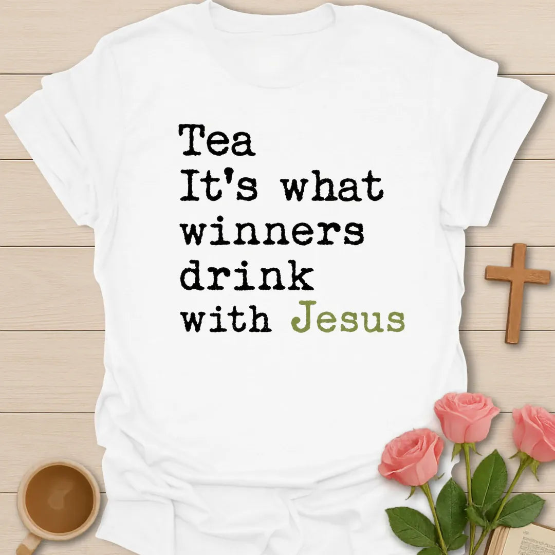 What Winners Drink With Jesus shirt with teacup, cross, and bold vintage lettering. - White