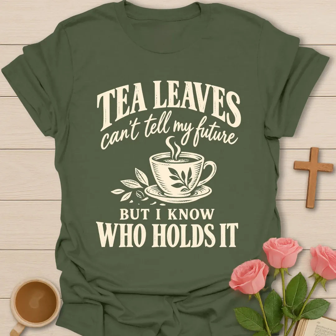 Who Holds It Christian t-shirt with faith-inspired lettering and design - Military Green